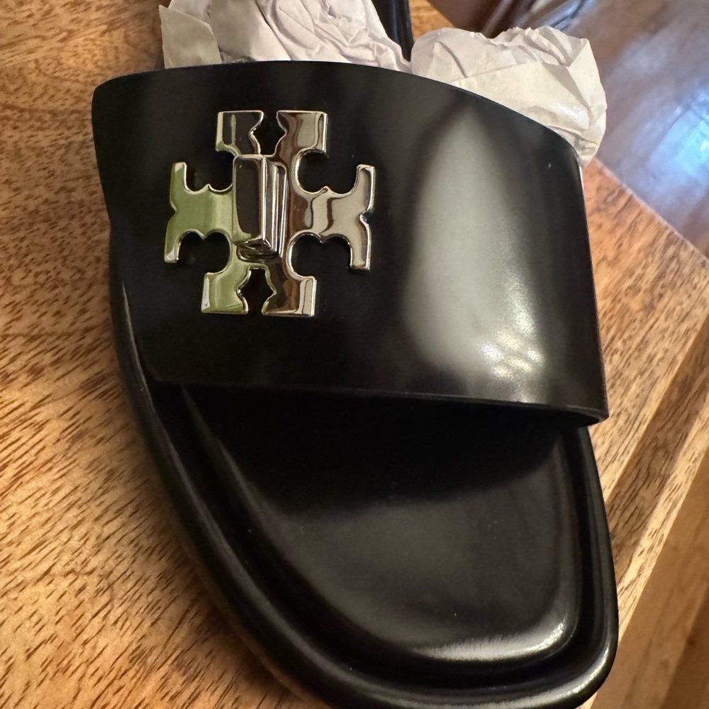 Tory Burch Black Slides with Silver Emblem - Picture 2 of 7
